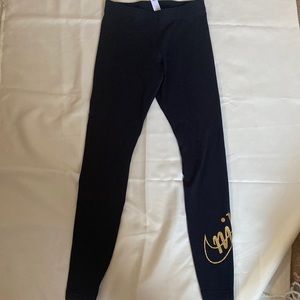 Nike leggings with glitter nike logo on left leg